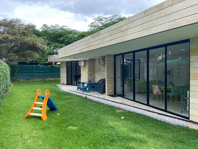 Modern home with a lawn
