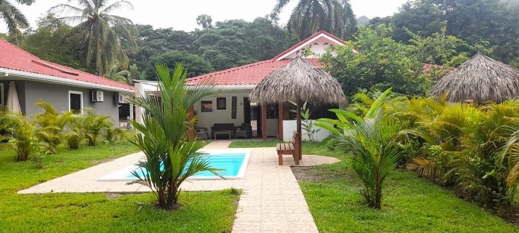 Villa with a pool and gardens