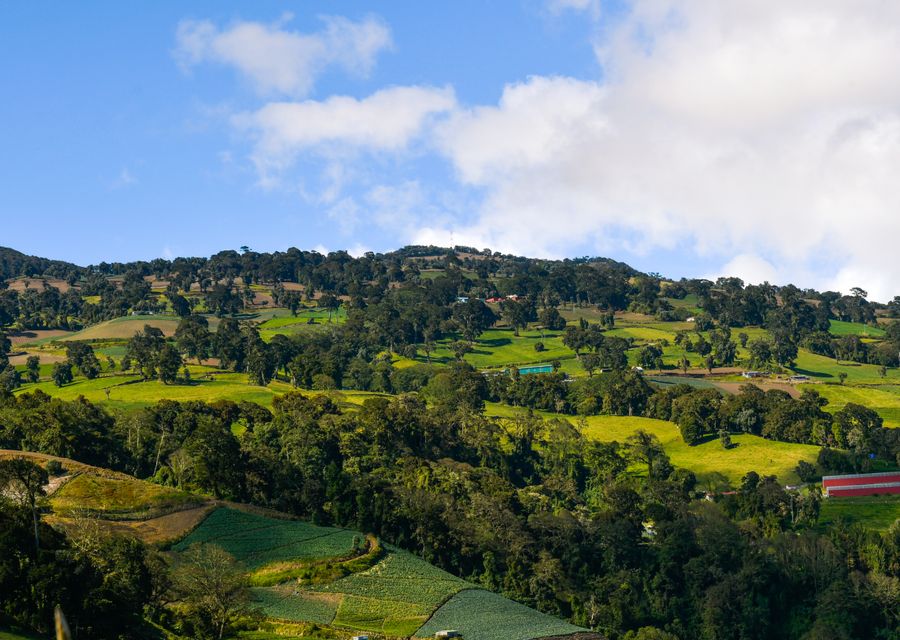 Large tract of green land divided into parcels in the Costa Rican highlands